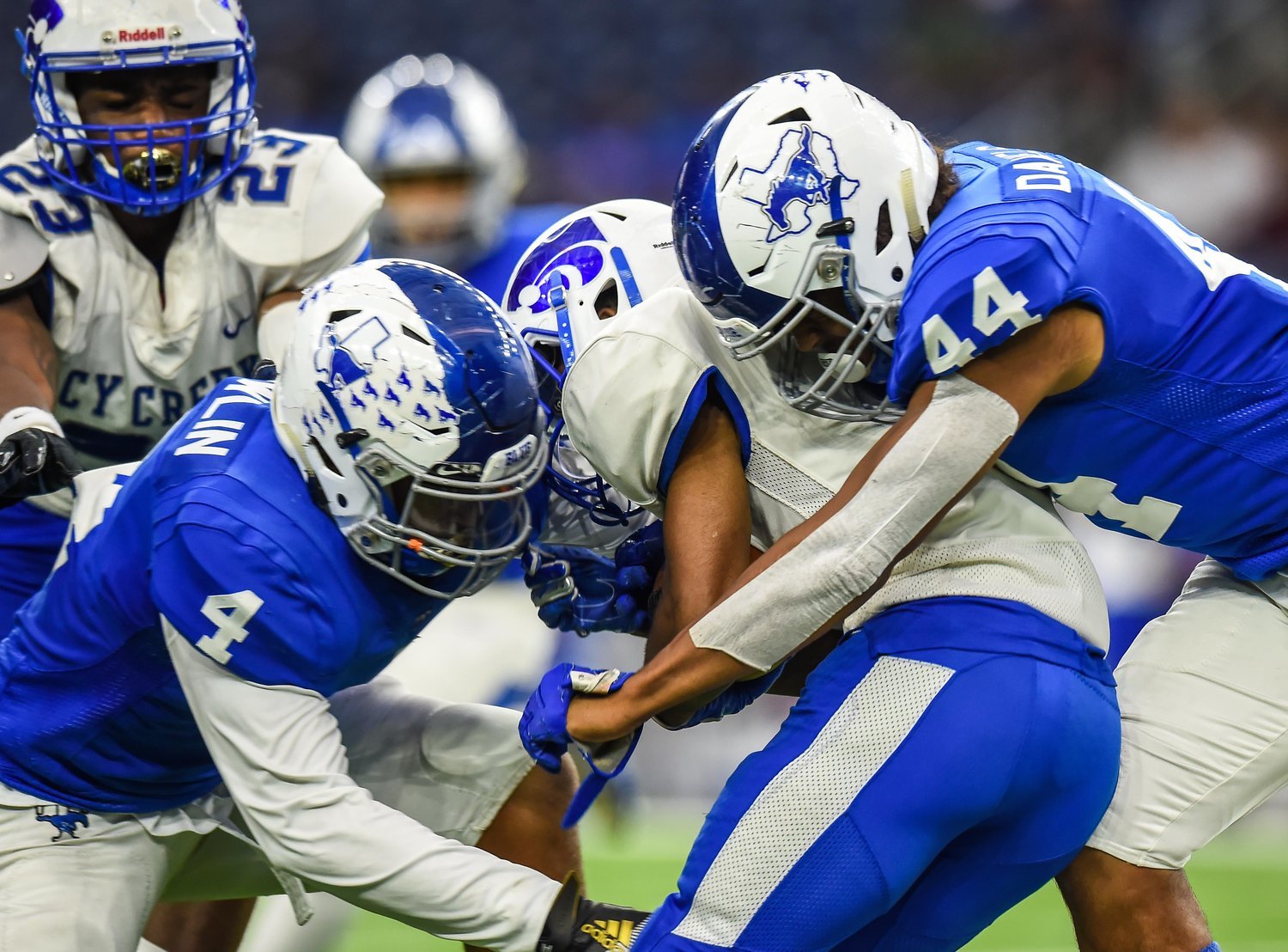 Houston, Tx. Dec 7, 2019: Taylor's Marcus Daniels (44) and Taylor's Martin Nowlin (4) make the stop on Cy-Creeks Jayden Gilbert (4) during the Regional Finals playoff game between Katy Taylor and Cy-Creek at NRG Stadium in Houston. (Photo by Mark Goodman / Katy Times)